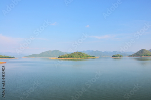 Fototapeta Naklejka Na Ścianę i Meble -  View landscape island lake river and mountain forest jungle for thai people and foreign travelers travel visit and camping rest relax at Kaeng Krachan Dam and National Park in Phetchaburi, Thailand