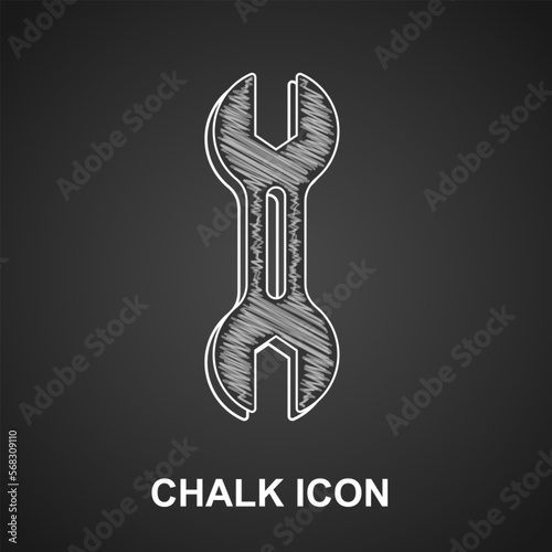 Chalk Wrench spanner icon isolated on black background. Vector