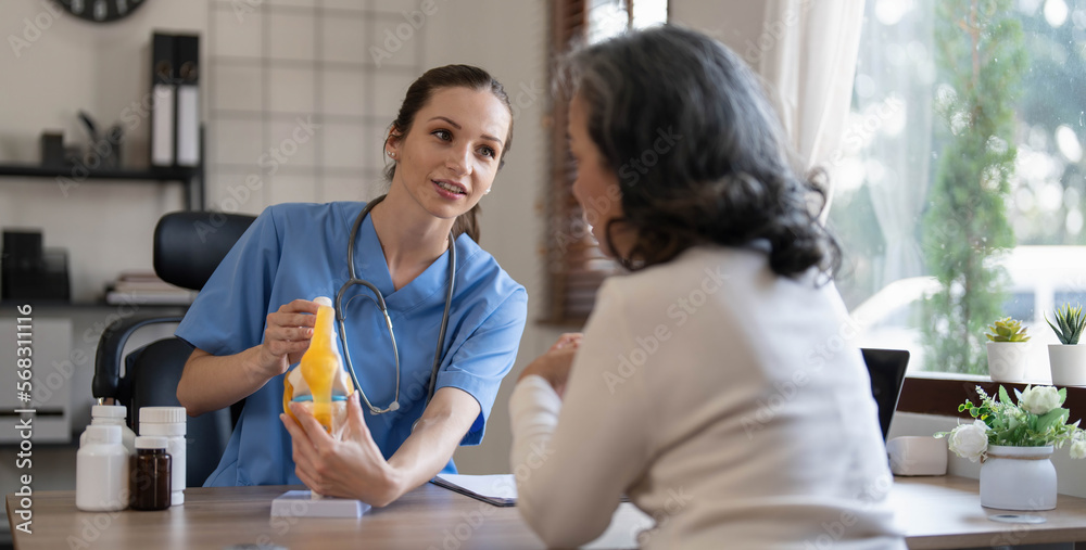 Fototapeta premium Doctor explain about back bone issue to fat woman patient. Health care and healthy lifestyle concept.