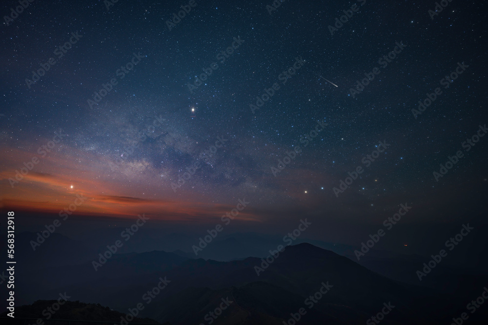Milky way over locating on mountain view between the hiking route to Doi pui ko, Mae hong son, Thailand.