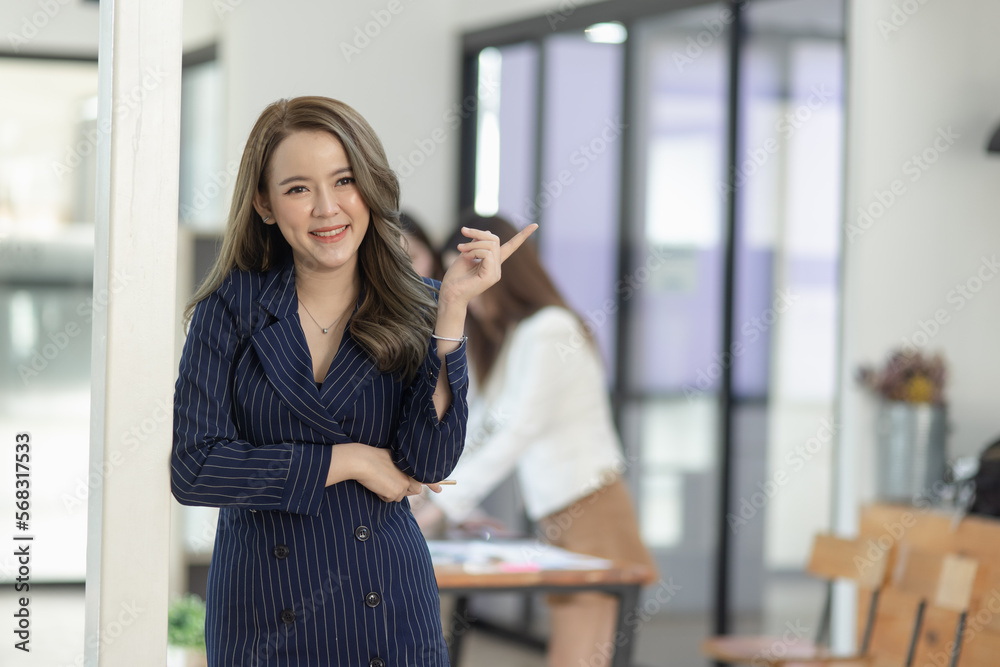 Group of young Asian business teamwork and presenting new projects in the office. Group of young Asian business teamwork and presenting new projects in the office.
