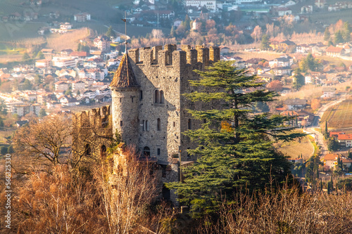 Castel Fontana in Tirol near Merano in Trentino Alto Adige - Italy with city background . beautiful warm colors scenery