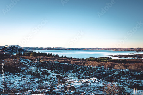 Fototapeta Naklejka Na Ścianę i Meble -  Iceland Thingvellir Þingvallavatn lake landscape with snow covered mountains in sunrise or sunset