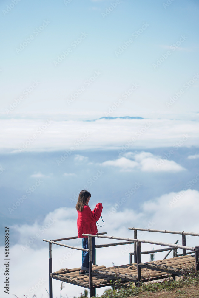 A solo Traveler enjoying the Cloud hunting time in Ta Xua, Son La in Northern Vietnam