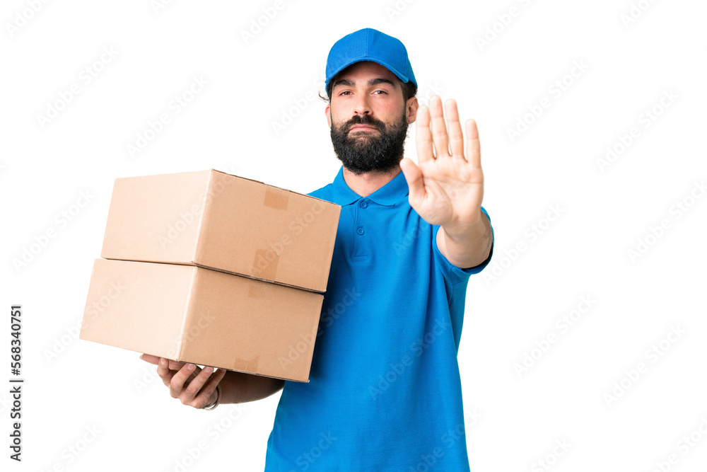 Delivery caucasian man over isolated chroma key background making stop gesture