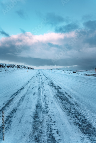 Iceland winter road mountain landscape with clouds