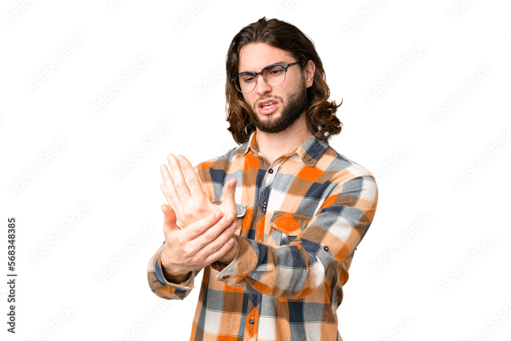 Young handsome man over isolated chroma key background suffering from pain in hands Young handsome man over isolated chroma key background suffering from pain in hands