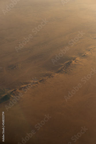 Sahara dessert seen from above in the sunset photo