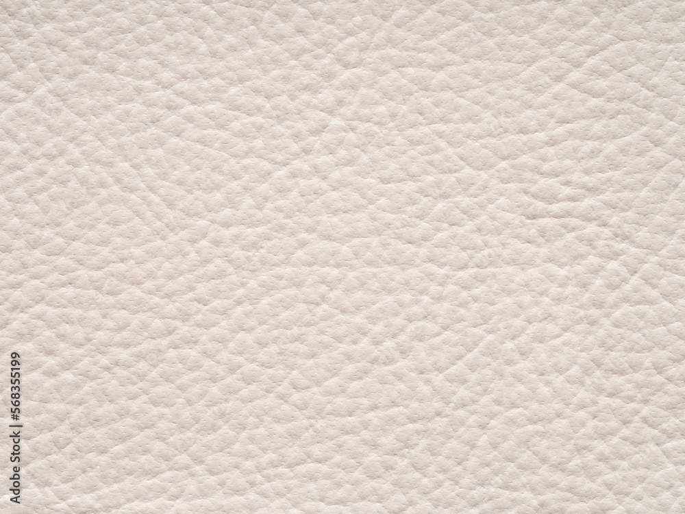 Beige leather texture sample. Genuine leather material closeup in light, soft tone. Background with copy space, top view. Backdrop blank skin effect for design, upholstered furniture, quality clothes. Beige leather texture sample. Genuine leather material closeup in light, soft tone. Background with copy space, top view. Backdrop blank skin effect for design, upholstered furniture, quality clothes.