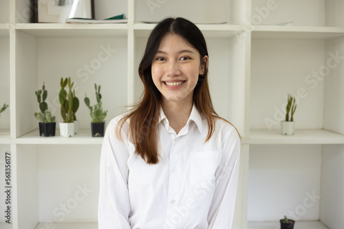 Portrait of smiling asian businesswoman.