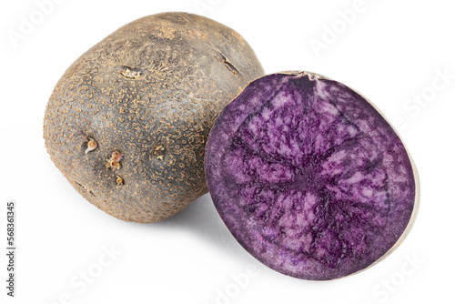 Vitelotte potatoes. Raw unpeeled purple potatoes isolated on white background, full depth of field.