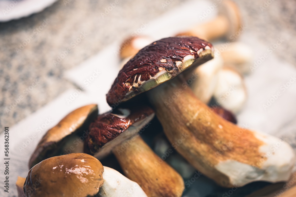 Clooseup delicious mushroom on a kitchen board. Clooseup delicious mushroom on a kitchen board.