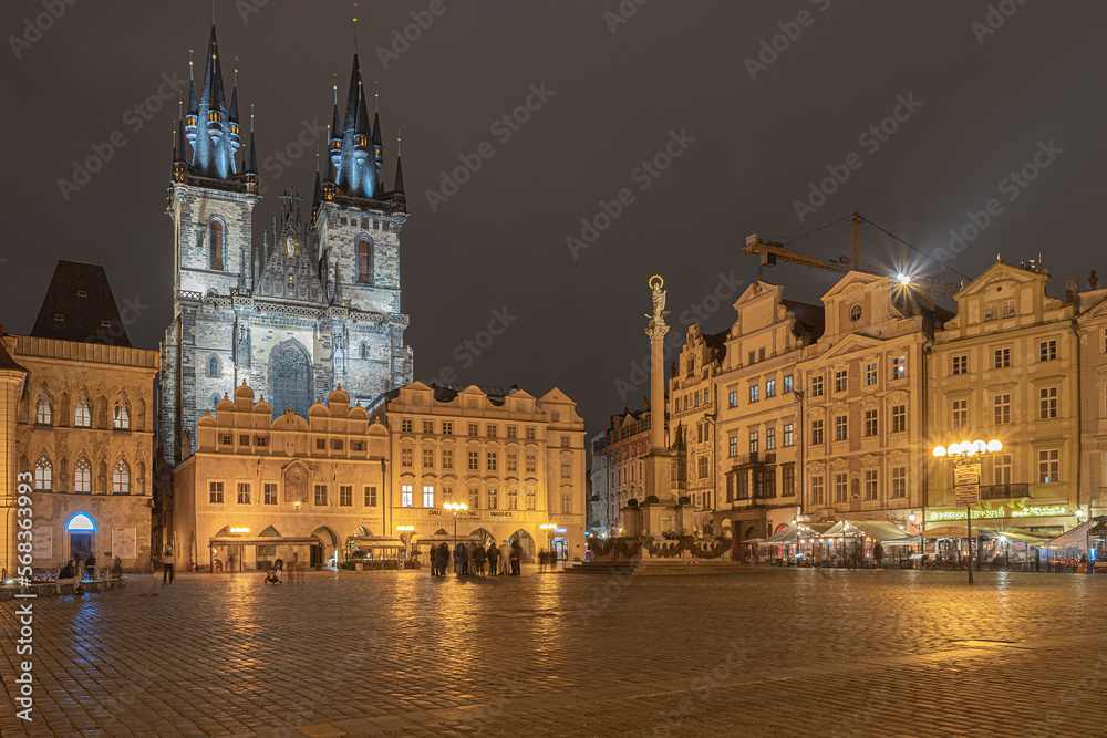 Views of Prague city at night, Charles Bridge in Prague with unrecognisable people on the move. Prague by night
