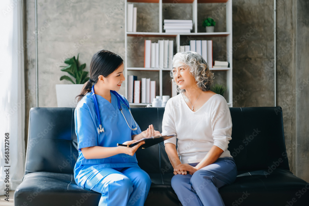 Medical doctor holing senior patient's hands and comforting her at home. Medical doctor holing senior patient's hands and comforting her at home.