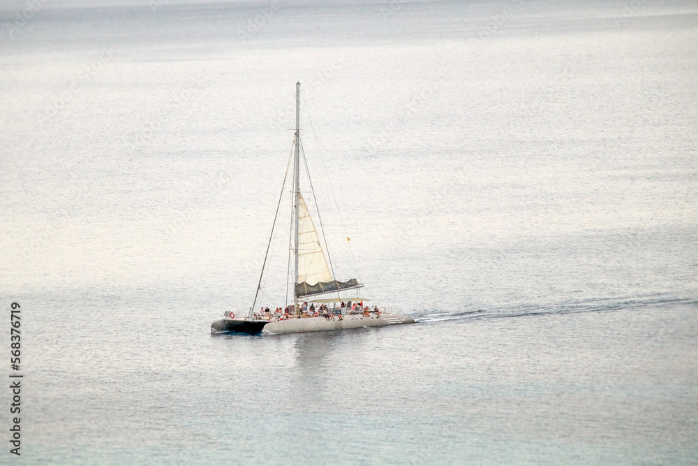 sightseeing catamaran with many tourists