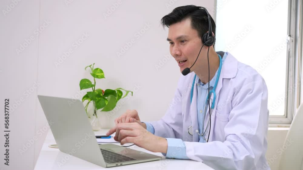 Asian woman doctor is online visiting with a patient on the internet application and Listening of the symptoms and explains how to treat the initial disease, Concept of Medical technology. Asian woman doctor is online visiting with a patient on the internet application and Listening of the symptoms and explains how to treat the initial disease, Concept of Medical technology.