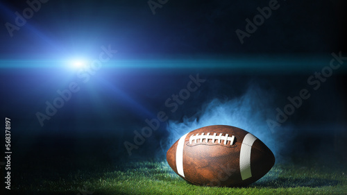 Ball for American football on a sports graund. USA game. Copy space. photo