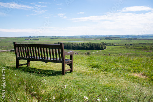 Bench with views of the Northumberland countryside near Hadrian's Wall, UK