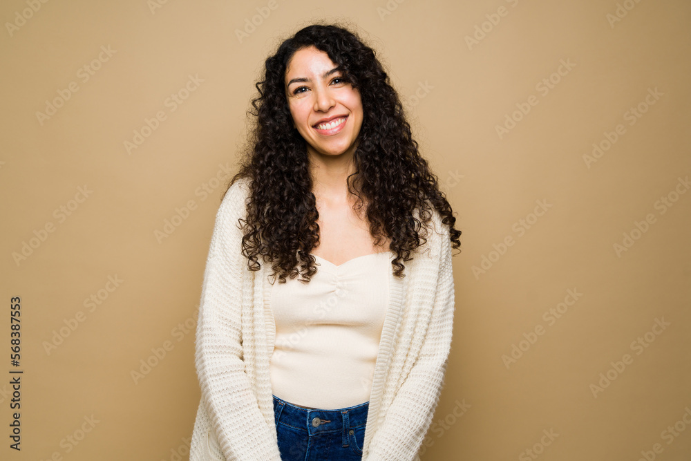 Happy attractive woman smiling looking cheerful Happy attractive woman smiling looking cheerful