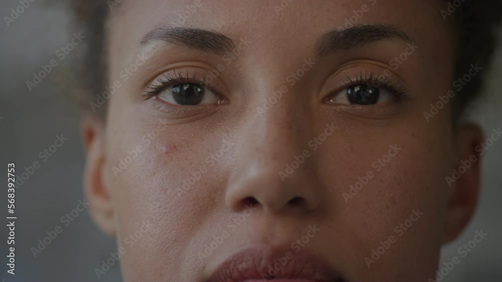 Woman eyes open in slow motion extreme close up Woman eyes open in slow motion extreme close up