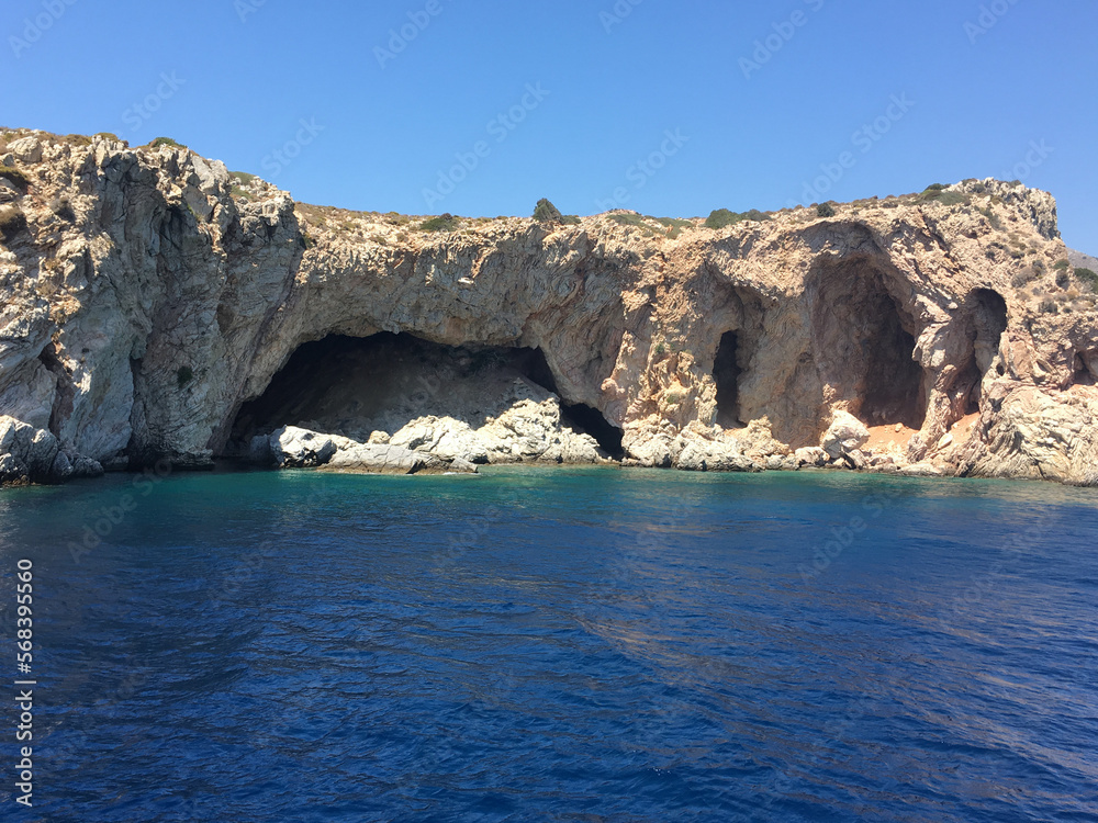 The cave called Karakoyuk after Palamutbuku on the Mediterranean side in Muğla Datca, Turkey. View from the cliffs down to a picturesque sea bay with cave.