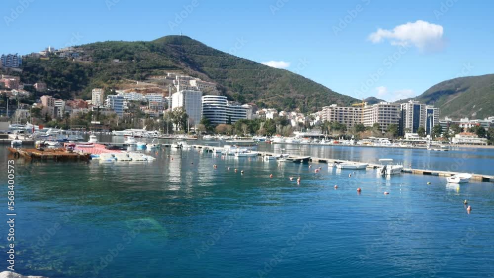Land with boats on the seashore. Boat port. City pier Land with boats on the seashore. Boat port. City pier