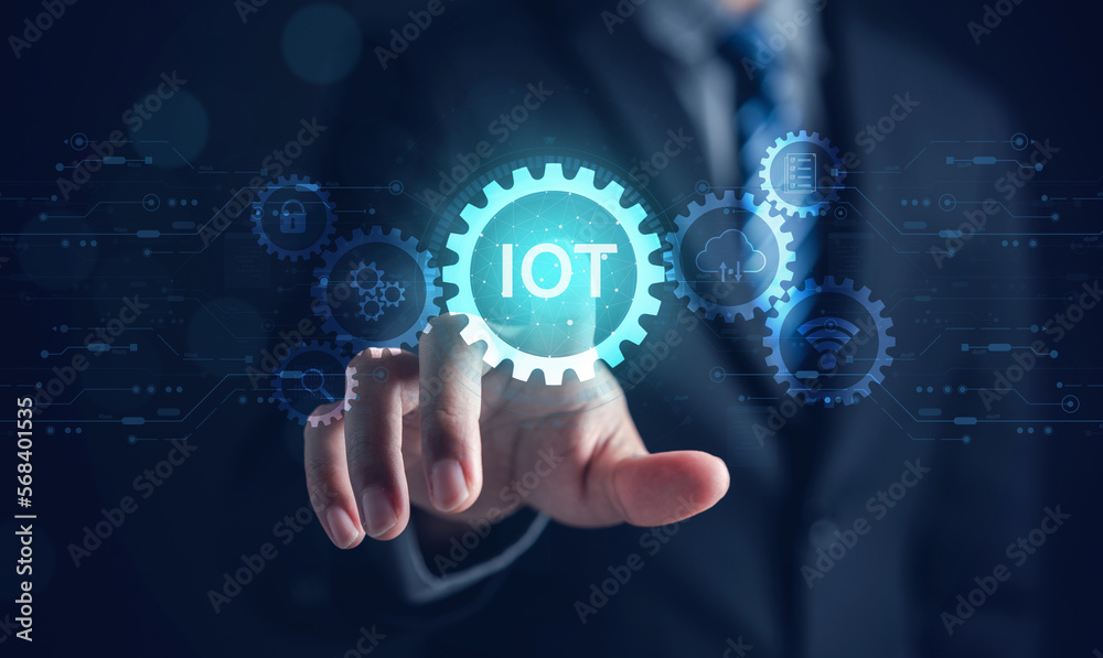 Businessman touching virtual screen interface IOT. Internet of Things technology database, with icons of typical IoT. Intelligent, social and media, cloud backup network system. Businessman touching virtual screen interface IOT. Internet of Things technology database, with icons of typical IoT. Intelligent, social and media, cloud backup network system.