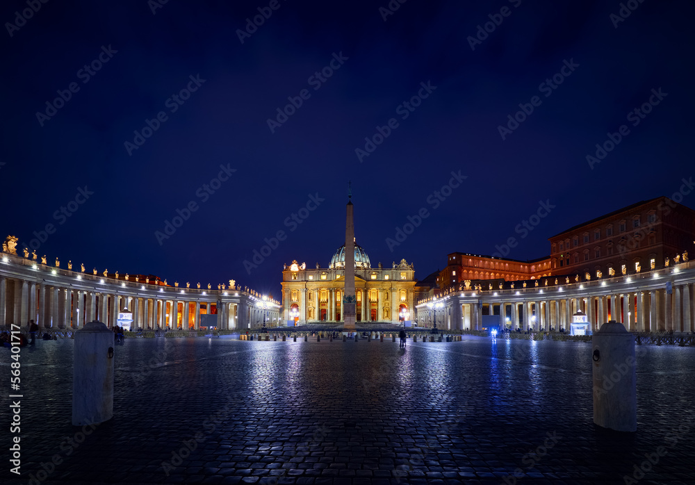 Vatican City (Holy See. St. Peter's Basil cathedral on Saint Square. Nighttime, blue hour with night sky and street lamps illumination. Rome, Italy. Famous travel destination touristic landmark Vatican City (Holy See. St. Peter's Basil cathedral on Saint Square. Nighttime, blue hour with night sky and street lamps illumination. Rome, Italy. Famous travel destination touristic landmark