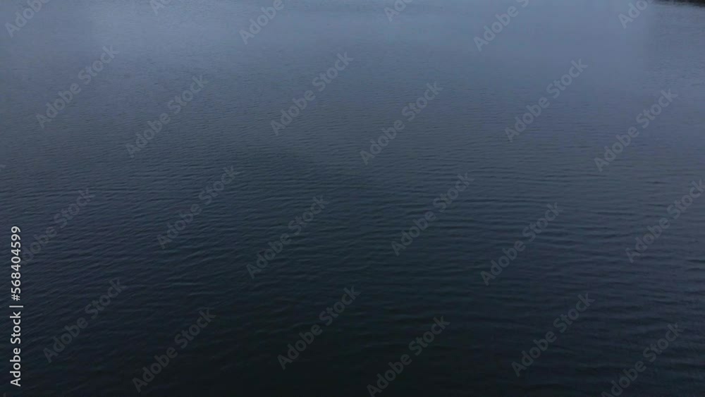 Top View. Panoramic drone shot of the beautiful scenery and the lake Top View. Panoramic drone shot of the beautiful scenery and the lake