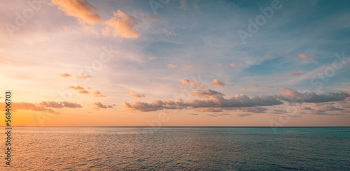 Panoramic sea skyline beach. Amazing sunrise beach landscape. Panorama of tropical beach seascape horizon. Abstract colorful sunset sky light tranquil relax summer seascape freedom wide angle seascape