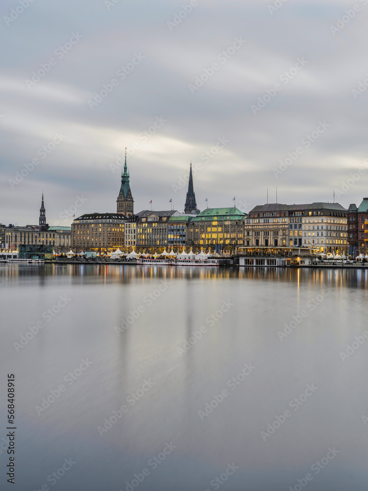 Hamburg city centre on lake Binnenalster after sunset during christmas, Germany