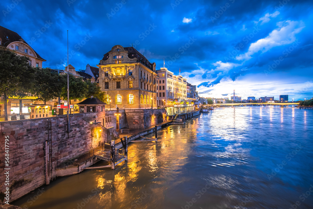 Naklejka premium Basel historic waterfront and Rhine river architecture evening view