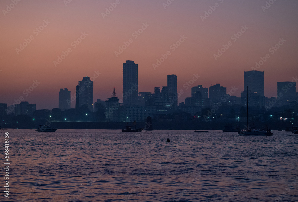 Mumbai coast line with taj mahal palace hotel and gateway of India.