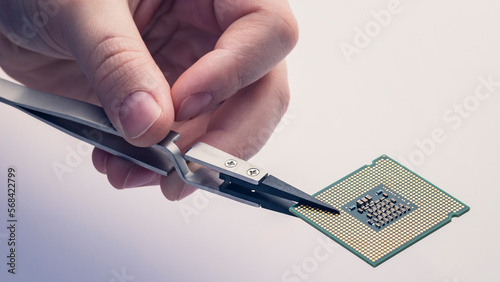 Technician fixing computer. Repair and upgrade concept of laptop. Workshop background