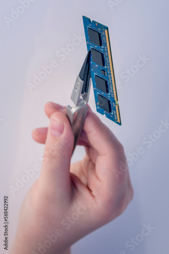Technician fixing computer. Repair and upgrade concept of laptop. Workshop background