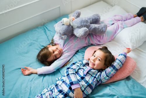 Canvas Print Adorable little girls in pajamas during their slumber party