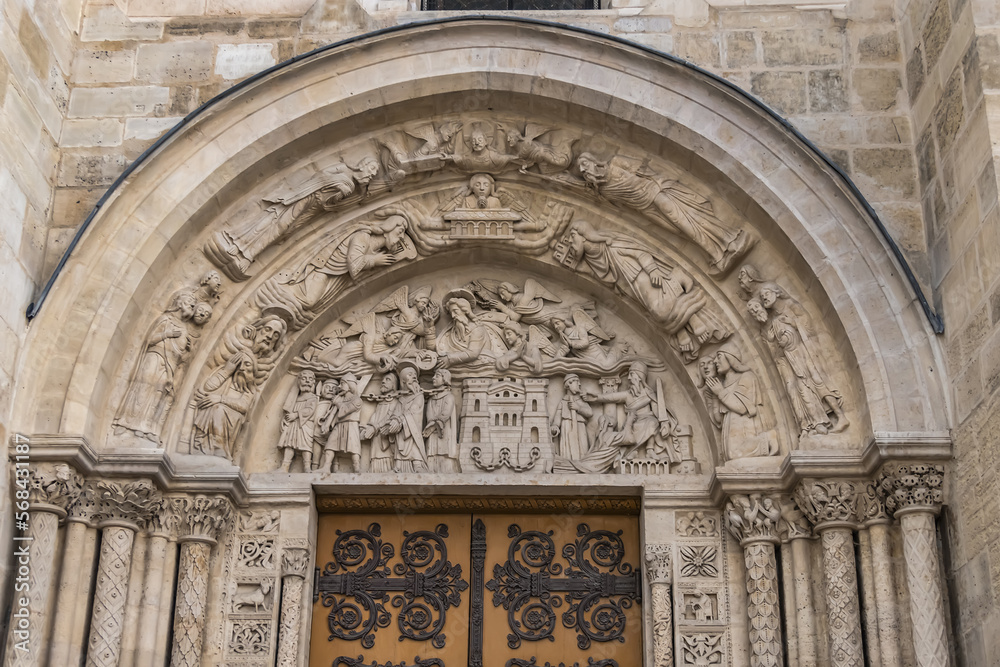 Fragments of the facade of Basilica of Saint-Denis (Basilique royale de Saint-Denis, from 1144) - former medieval abbey church in city of Saint-Denis, a northern suburb of Paris. France.