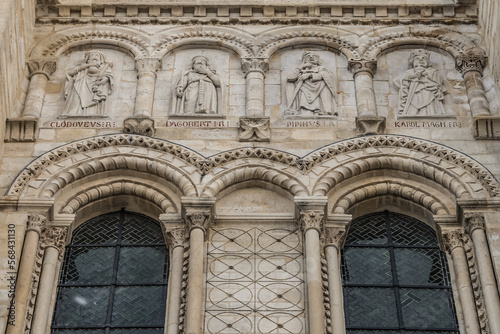 Fragments of the facade of Basilica of Saint-Denis (Basilique royale de Saint-Denis, from 1144) - former medieval abbey church in city of Saint-Denis, a northern suburb of Paris. France.