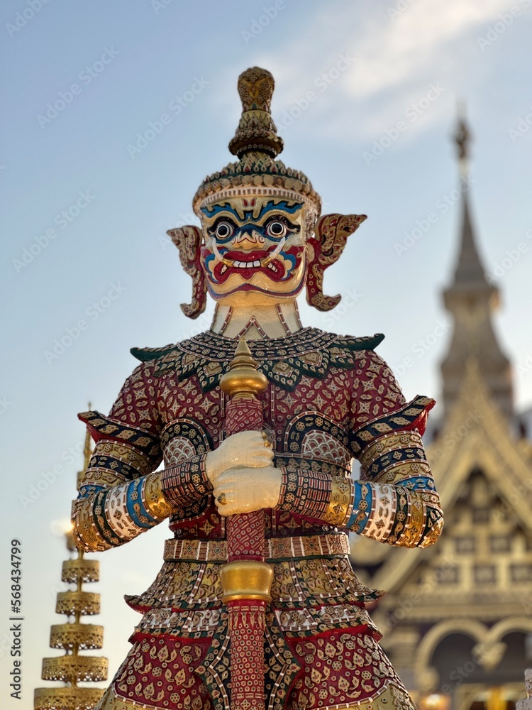 Fototapeta premium Portrait of Thao Wessuwan Statue with the blue sky in the background. Sensitive focus