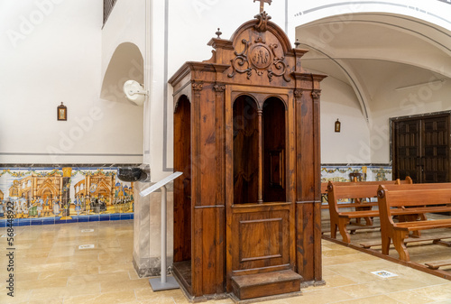 Wall Mural Wooden confessional inside a Christian church