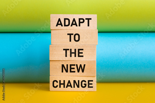 Adapt to the new change, Written on wooden blocks, colorful background, Adapting quickly to changes, new business, life situations, market changes, Open mind to new opportunities photo