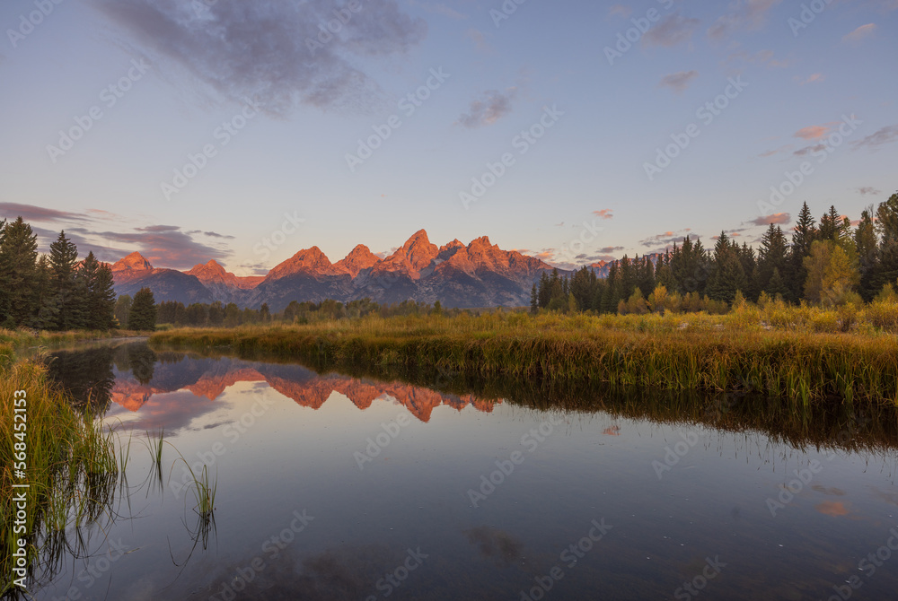 Scenic Sunrise LAndscape Reflection in the Tetons in Autumn