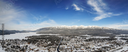 Panorama of Whitefish, Montana and lake towards the Rocky Mountains and its ski resorts photo