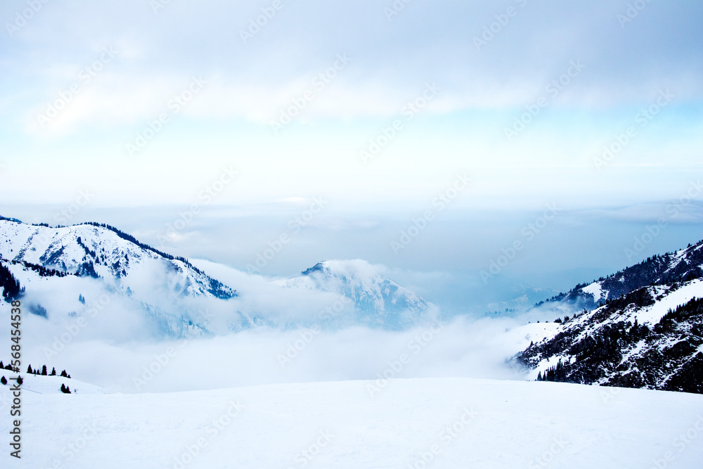 panorama of mountains. clouds on top of mountains