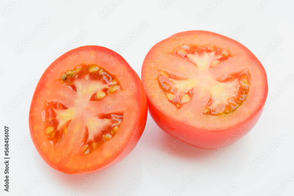 Fresh Tomato sliced isolated on white background. Fresh Tomato sliced isolated on white background.