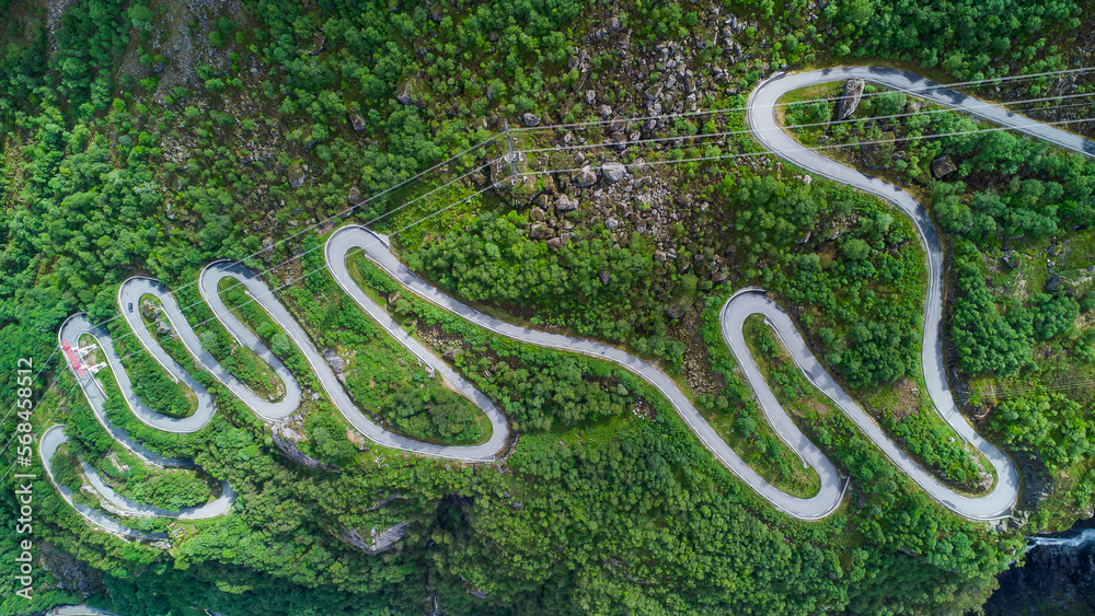 Obraz premium Aerial drone view of the windy road Lysevegen down to the Lysefjorden in Norway on a beautiful summer day