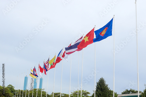 The flags of Association of Southeast Asian Nations or ASEAN over the clear blue sky.  photo