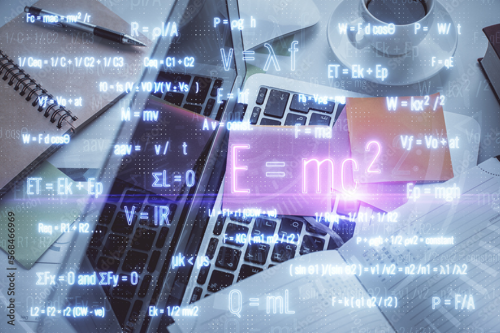 Physics and math theme hologram with formula drawings over computer on ...
