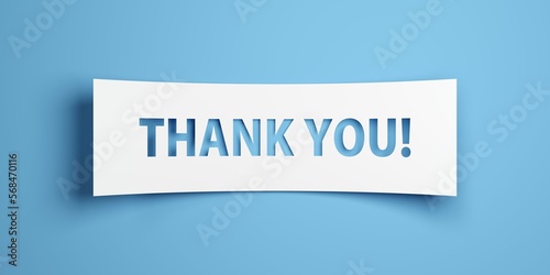Thank you text on white paper cut out over blue background, gratitude concept photo