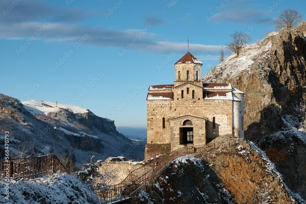 church on rock in snow, monastery on mountain, chapel, pagoda, winter landscape, snow on roof and slopes of mountains, church on rock